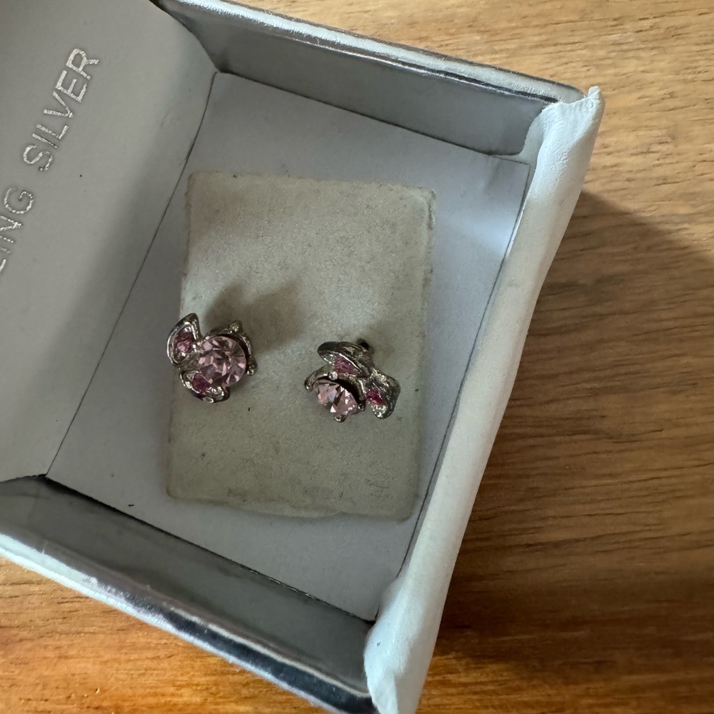 Silver and crystal earring never used